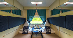 Спальный вагоны повышенной комфортности в поезде «Таврия»
