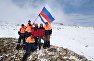 Крымские спасатели с флагом России на вершине Ангар- Бурун