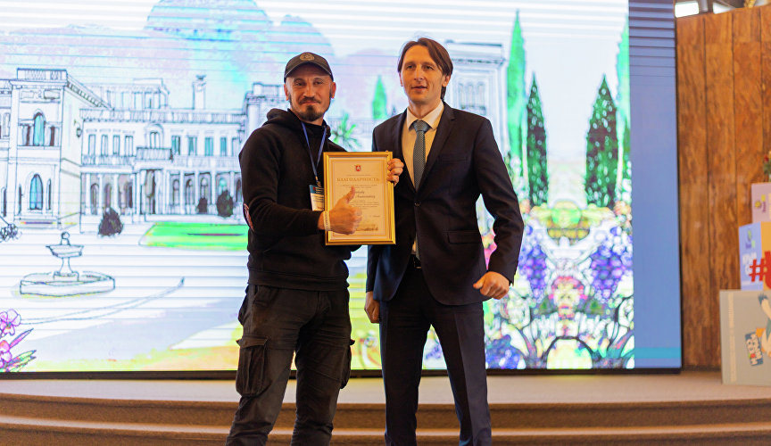 Награждение научного сотрудника Научного спелео-палеонтологического комплекса «Пещера Таврида» Богдана Зайцева